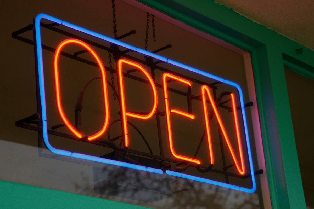 bigstock-Red-and-blue-lit-neon-sign-at-16539614-1200x800.jpg